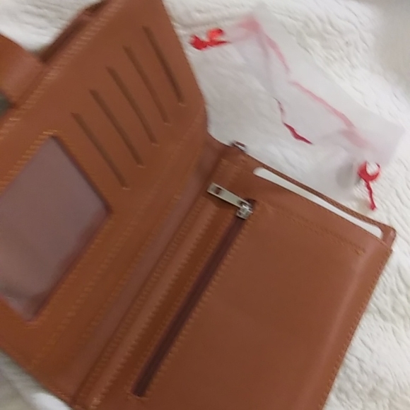 STG hand purse with shoulder strap and slip to put phone. Never used - Picture 4 of 12